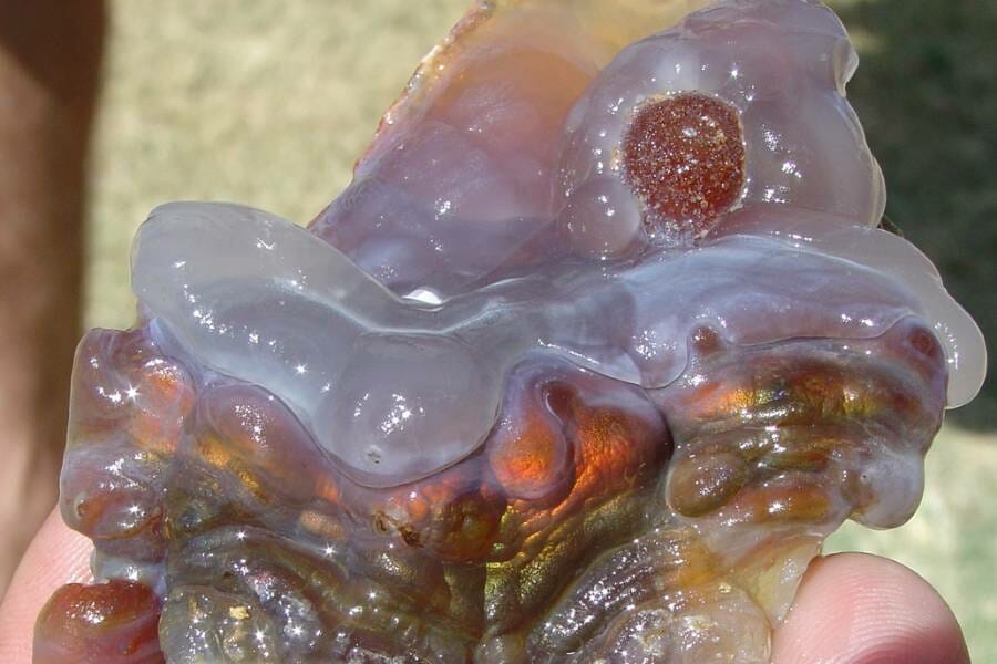 A translucent chunk of fire agate