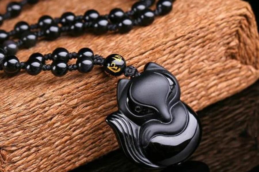 A unique black obsidian fox necklace