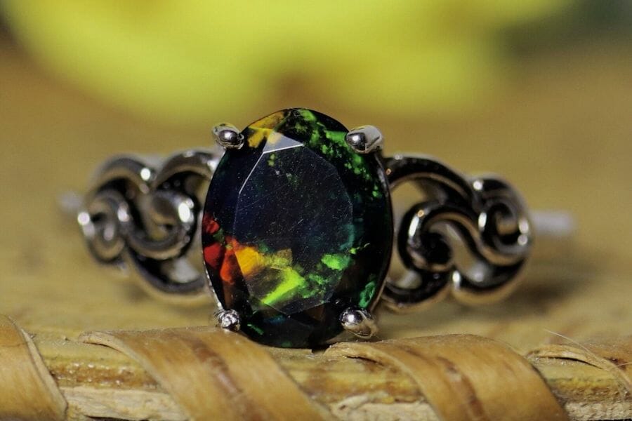 A stunning black opal ring