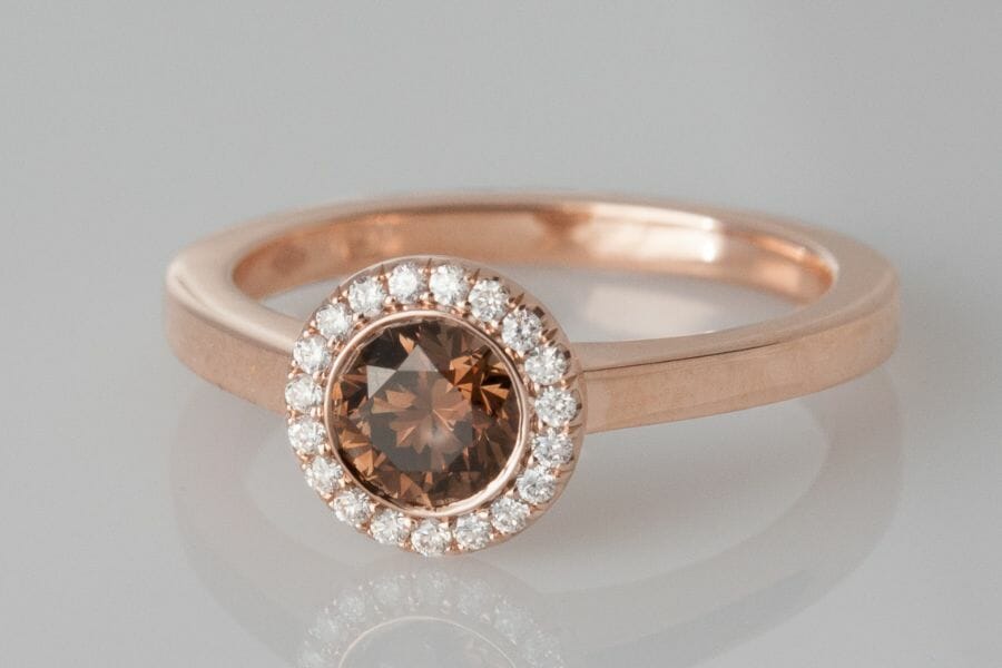 Brown diamond ring with a round cut