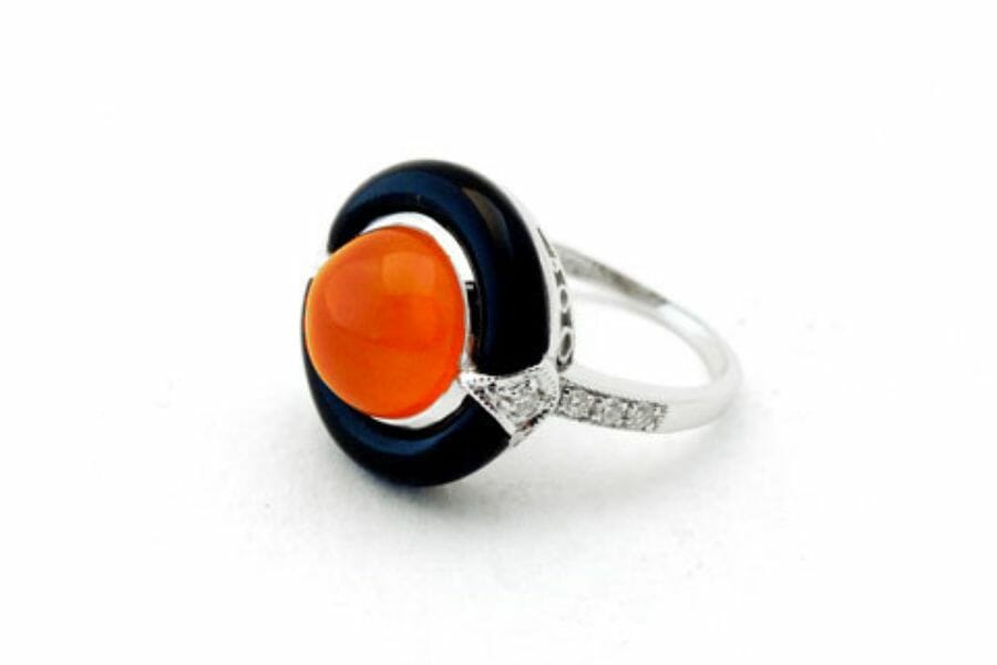 A pretty carnelian onyx ring with crystal details