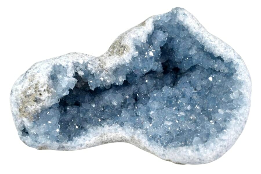 A large piece of an open Celestite geode exposing its dark blue to gray sparkling crystals