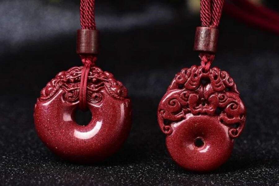 A pair of stunning cinnabar necklaces