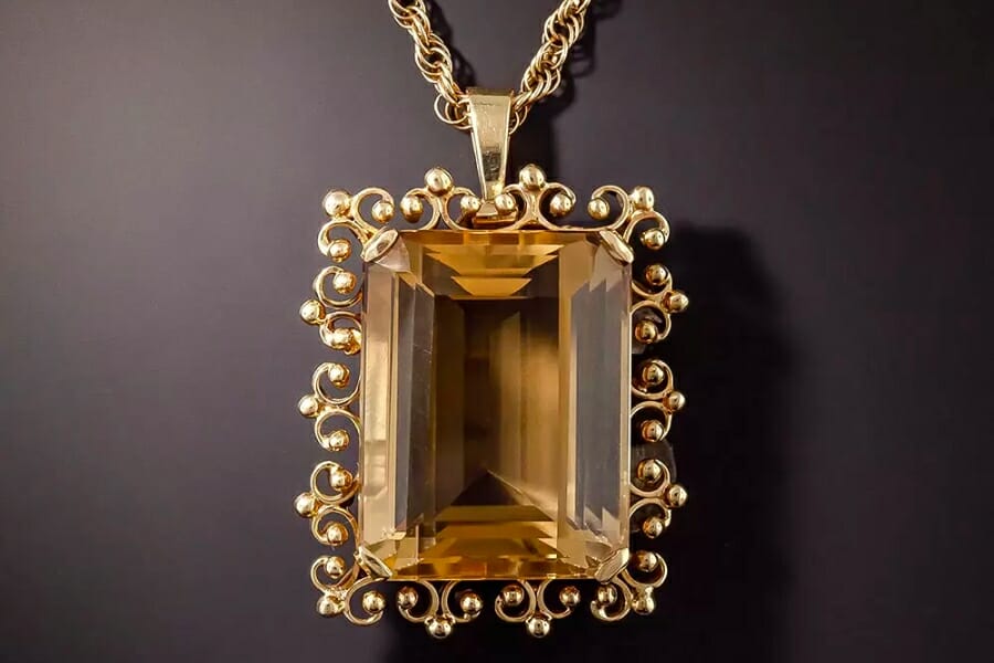 A mesmerizing piece of almost transparent yellow citrine set as a pendant