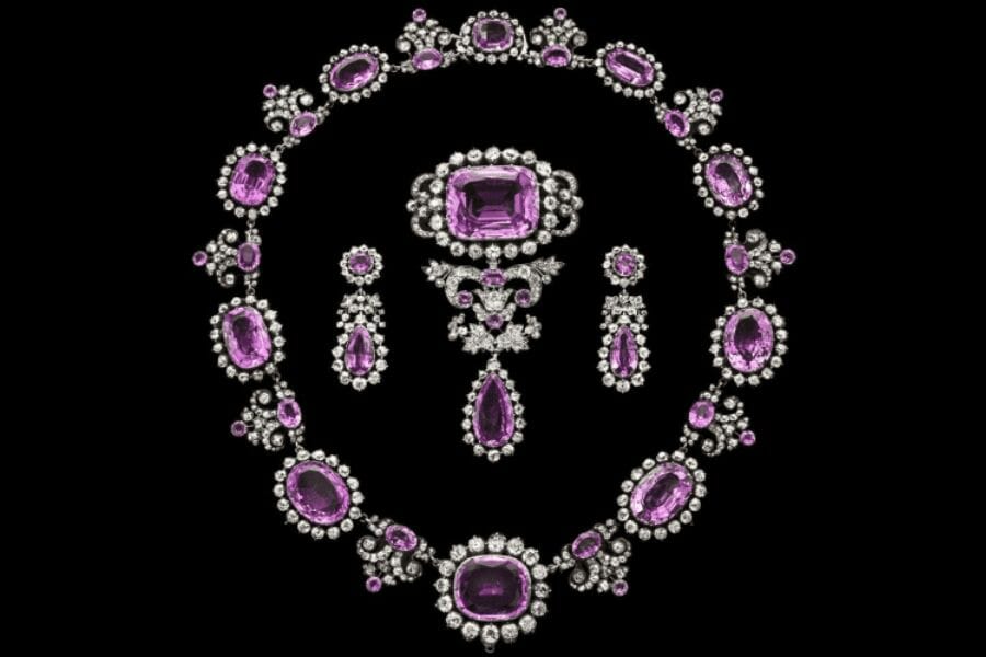The Crown Amethyst Suite of Jewels with a pair of earrings, brooch, and necklace all with gorgeous purple Amethysts
