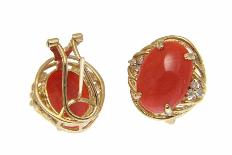 A pair of elegant deep pink coral earrings