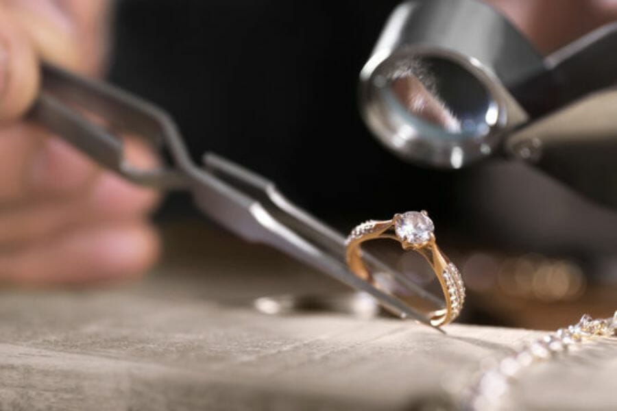 Appraising a diamond using a magnifying lens