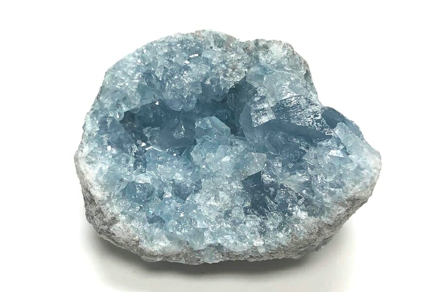 A mesmerizing photo of an open Celestite Geode showing its bluish gray to dark blue crystals