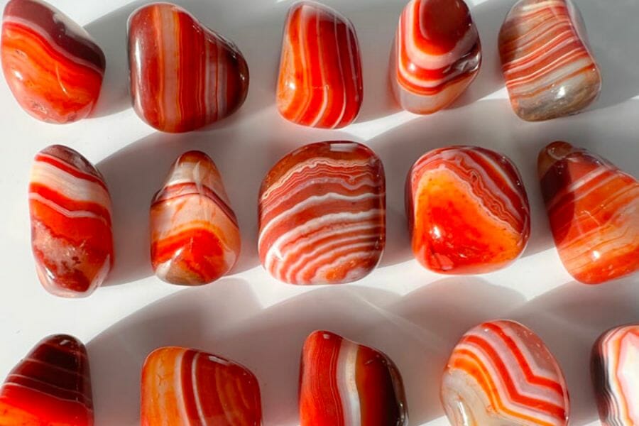 An organized bunch of orange banded Agates