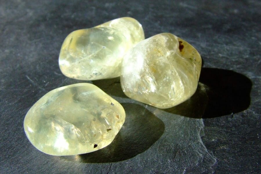 Three stunning pieces of shiny, light yellow Amblygonite crystals