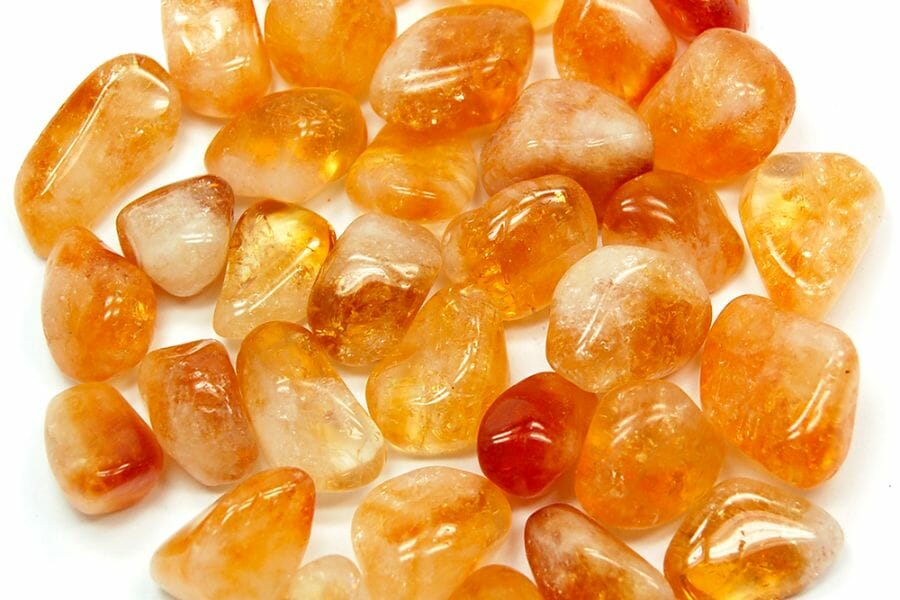Bunch of polished, shiny orange Citrine crystals