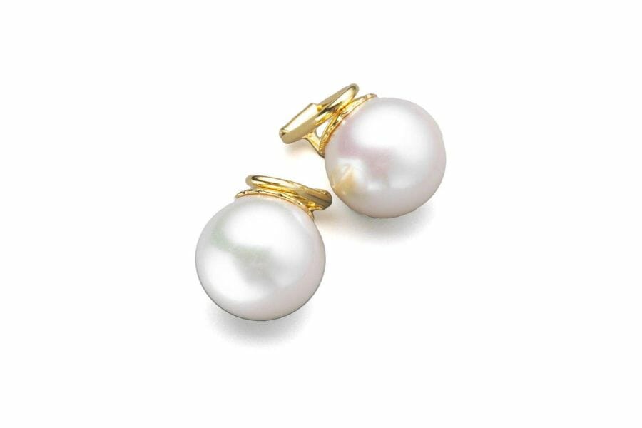 A pair of majorica pearl earrings