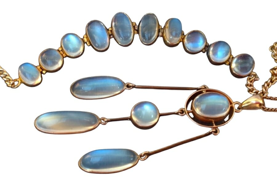 A bunch of gold jewelry with pretty White Moonstone cabochons