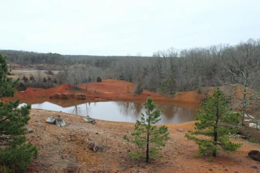 A picturesque area at Moselle Iron Mine with a lake in the middle 