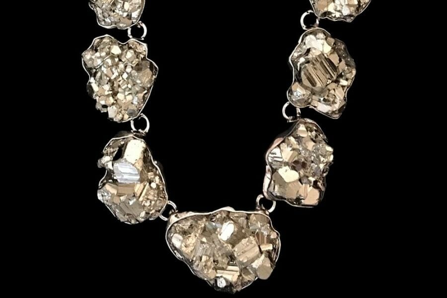 Several Fool's Gold Nuggets used as accent stone to a silver necklace