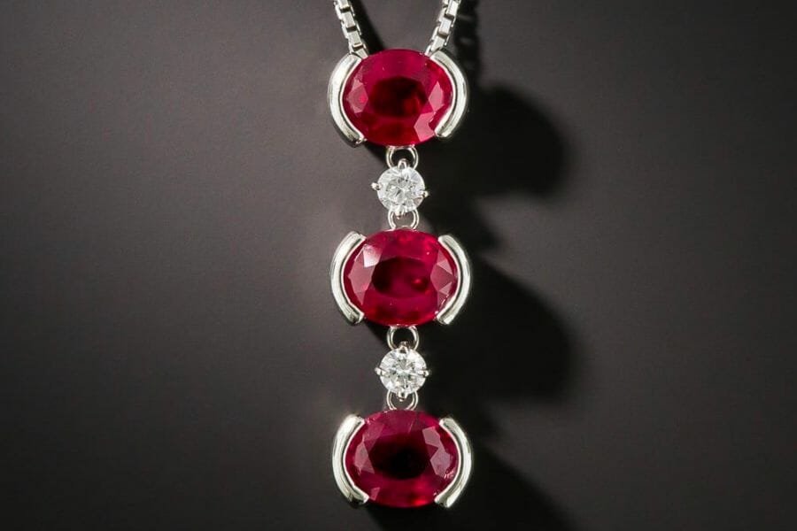 Three sparkling pieces of Ruby gem as pendants to a necklace