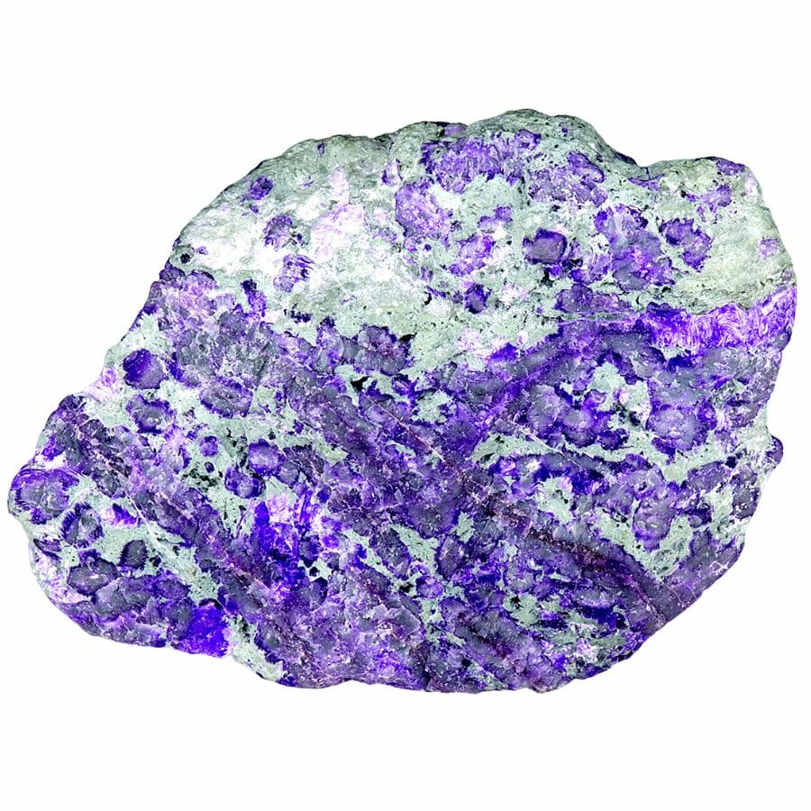 Large cluster of bright purple Sugilite crystal
