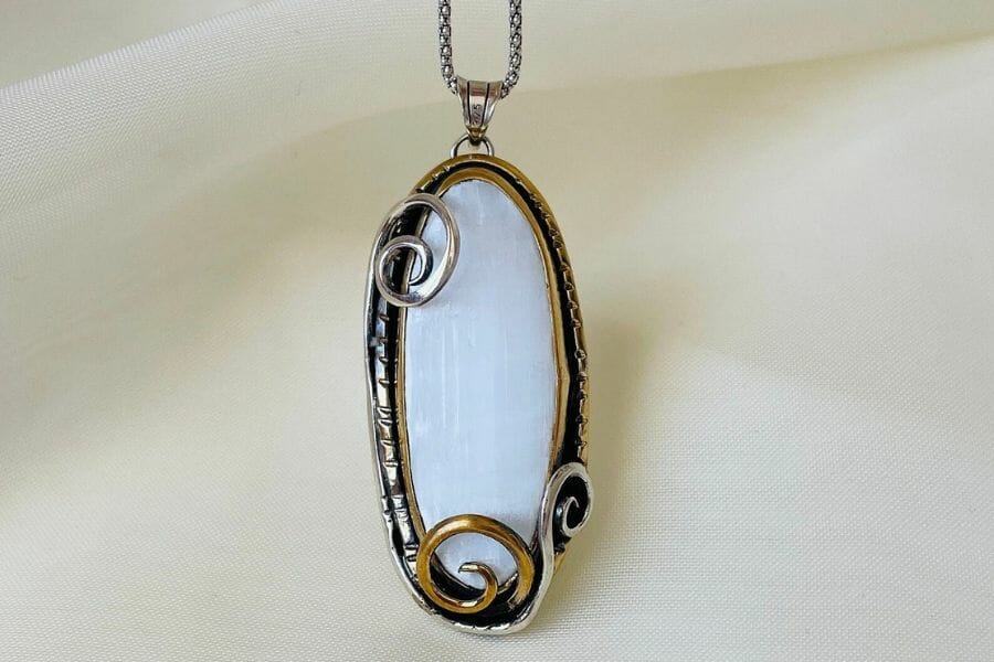 A beautiful oval selenite necklace pendant