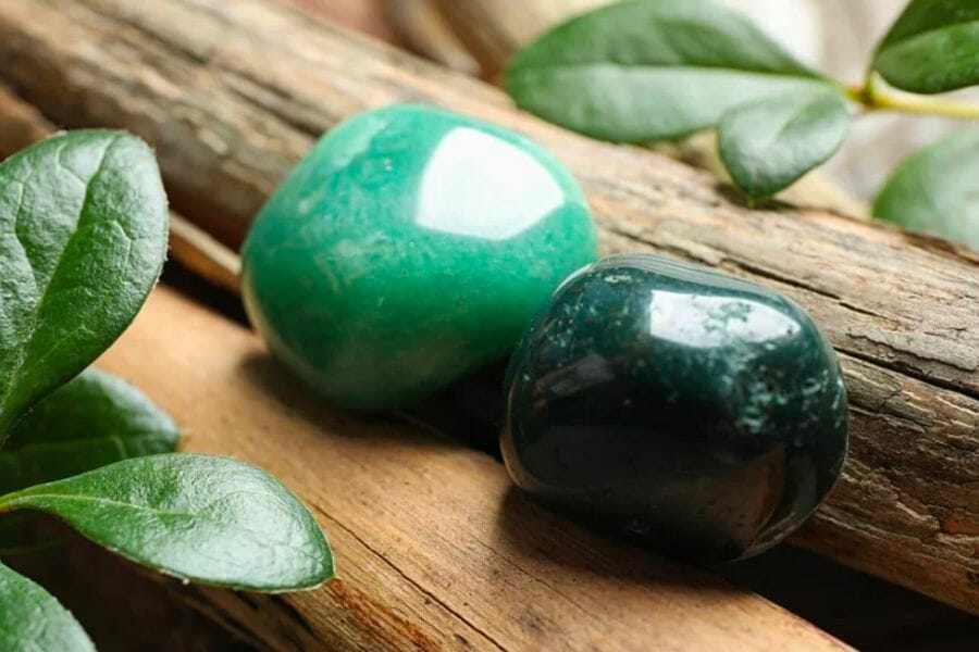 Two pieces of polished Green Aventurine in varying intensities of green hue