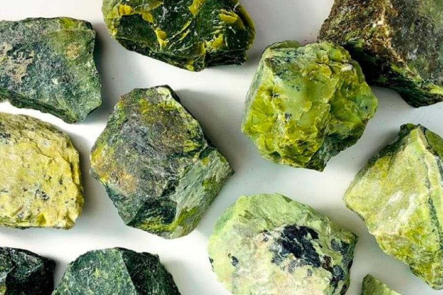 A bunch of rough, yellow green Serpentine crystals 