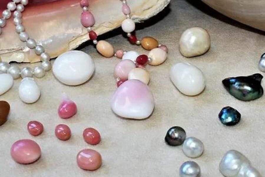 Various shapes, sizes, and colors of pearls