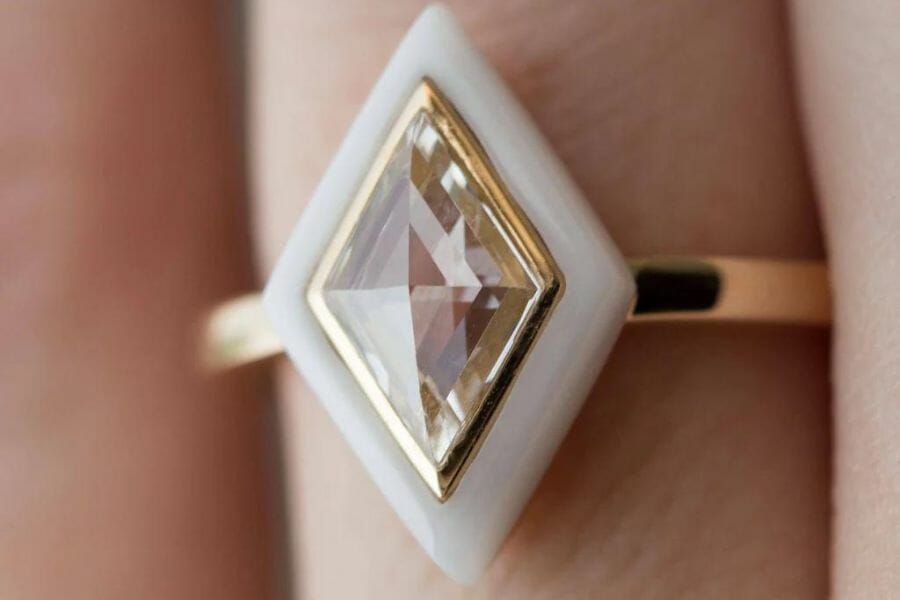 A dazzling white onyx diamond-shaped ring