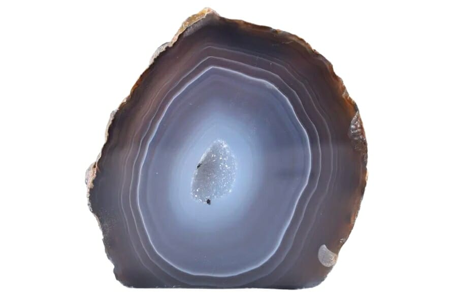 An opened Blue Agate Geode with details of gray