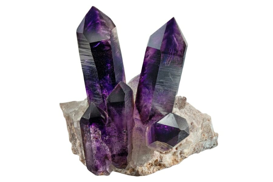 A stunning specimen of deep purple Amethyst crystals