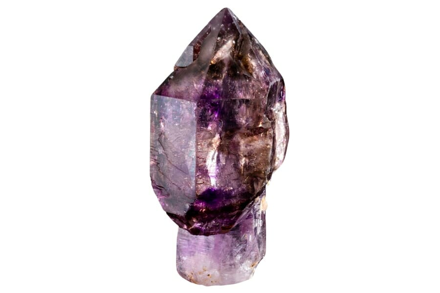 A vivid photo of a sparkly Amethyst crystal with dark to light purple hues