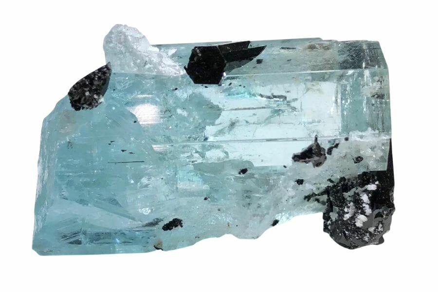 A dazzling aquamarine crystal with spots of black tourmaline