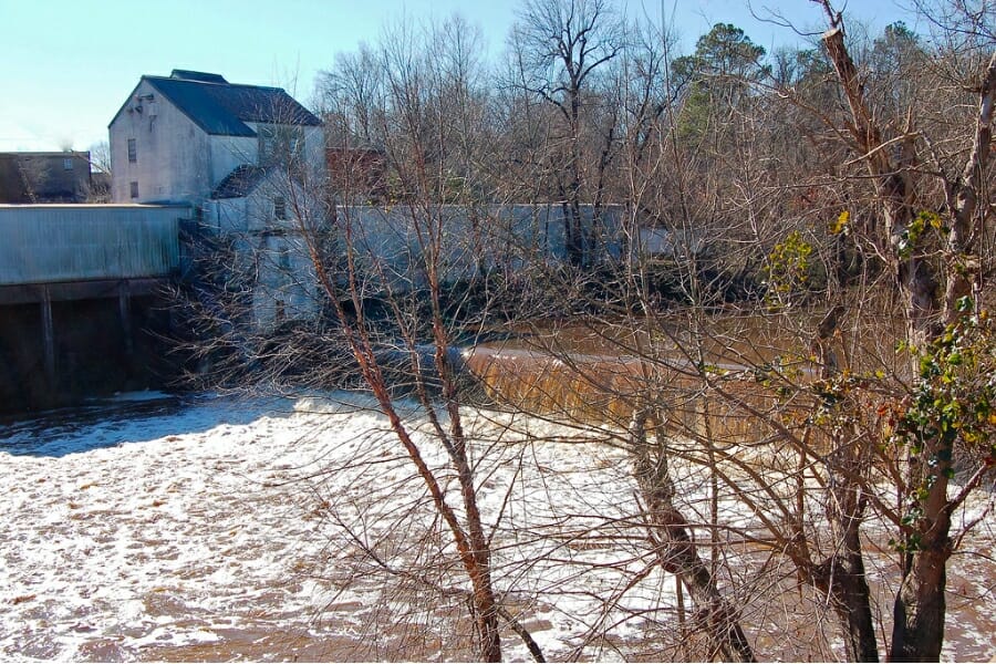 A view of the streams and surrounding structures of Ashland Mill
