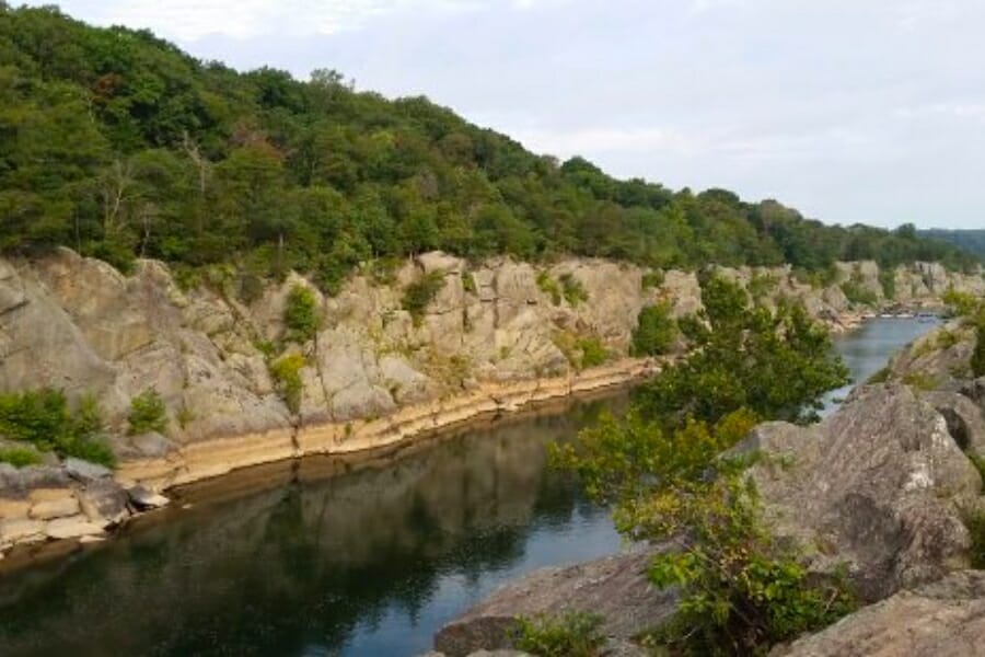 A stunning view of the stretch of Bear Island, including its rock formation and trees