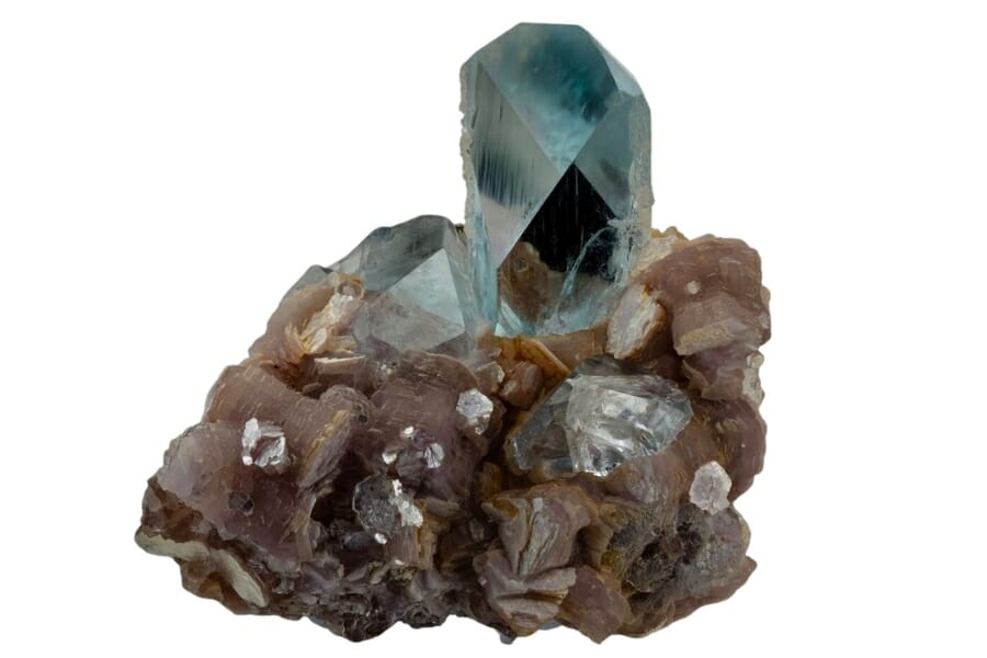 A stunning Blue Topaz crystal on lepidolite