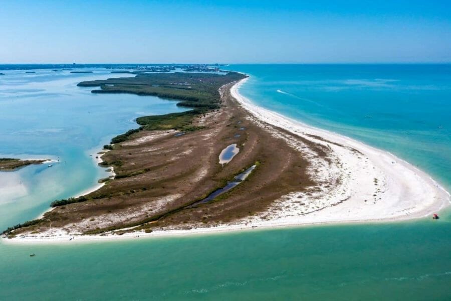 A nice aerial view of the Caladesi Causeway surrounded by pristine blue waters