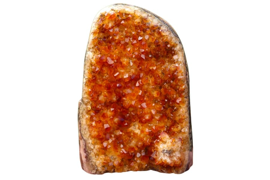 An open Citrine Geode with small, shiny, orange crystals