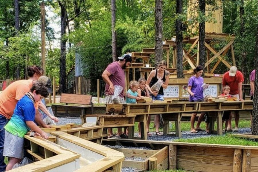 Families rockhounding for minerals and rocks at the Dark Woods Adventure Park