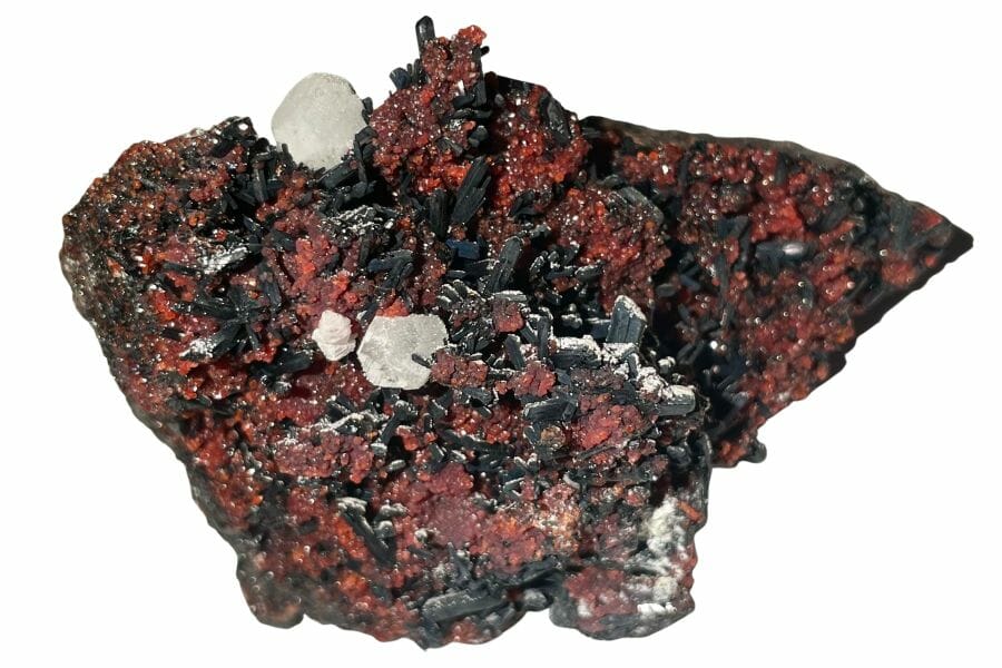 A beautiful garnet crystal with other minerals around it