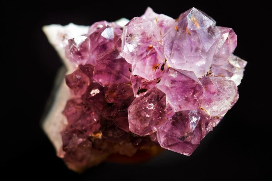 A stunning amethyst crystal with an irregular shape