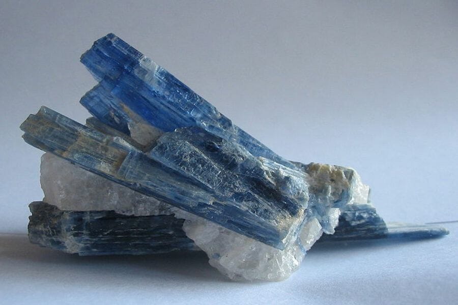 Gorgeous blue kyanite crystals with white minerals beneath it