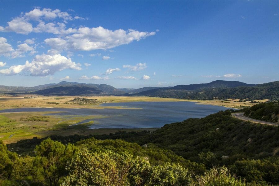 An aerial view of Lake Henshaw surrounded by mountains