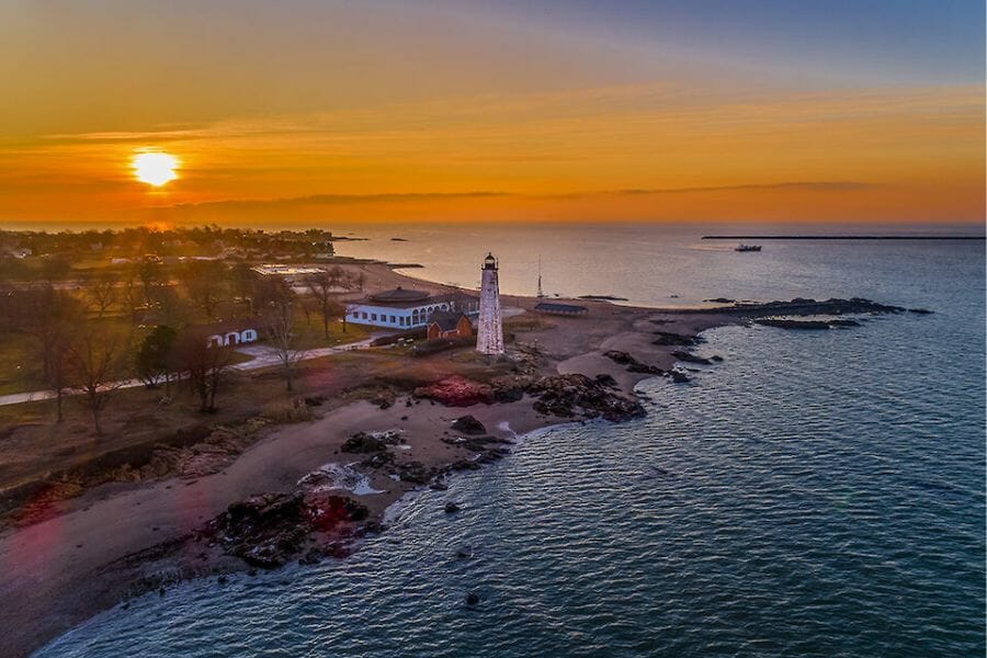 Beautiful sunset at the Long Island Sound, with shores filled with rocks and various minerals