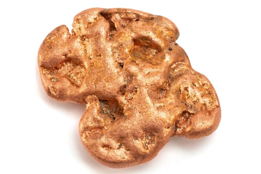 A shiny, bronze-colored copper nugget found in Michigan