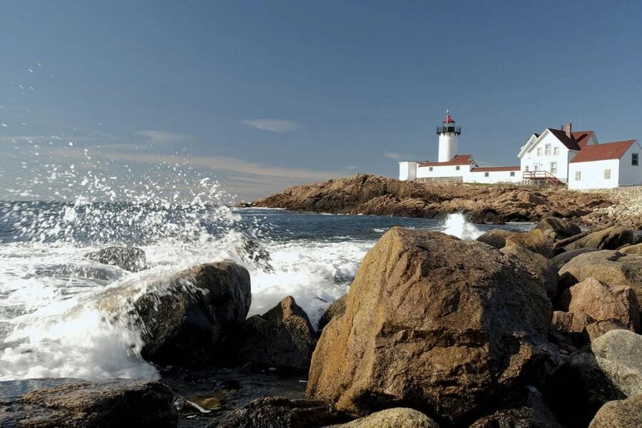 Huge waves hit big rocks around Massachusetts Bay