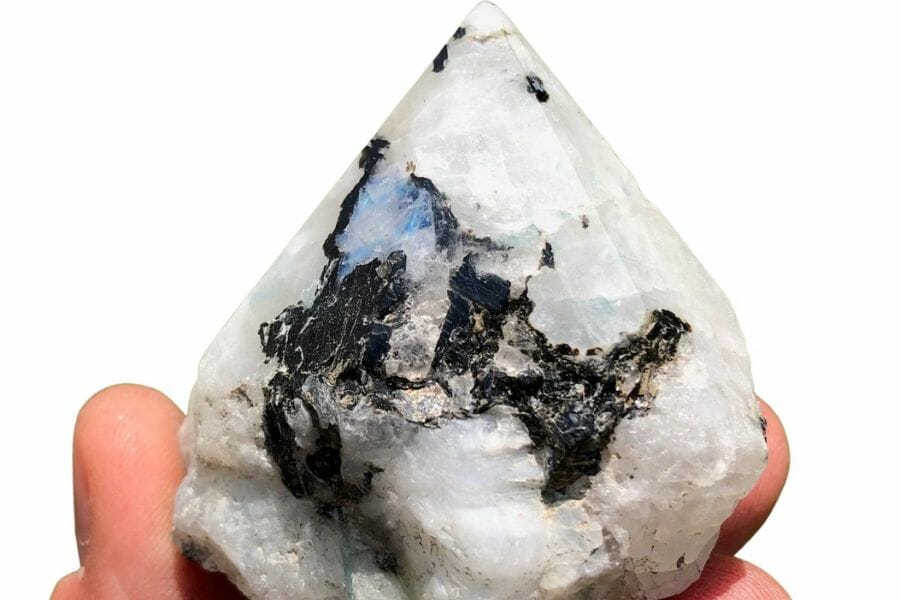 A pretty black and white moonstone with a pointy end at the top