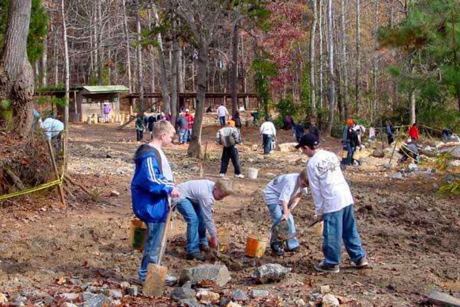 A group of kids digging at the Morefield Mine