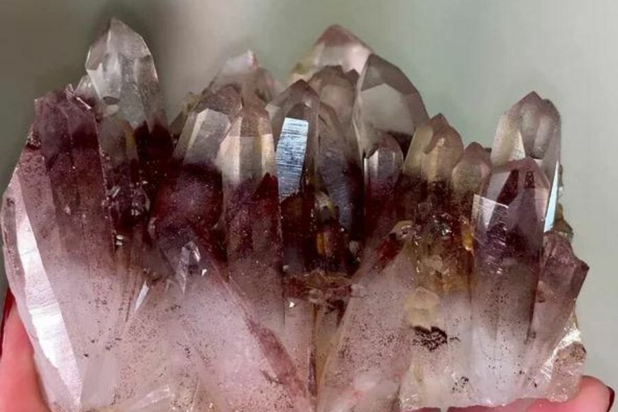 A gorgeous phantom quartz crystal with purple hues