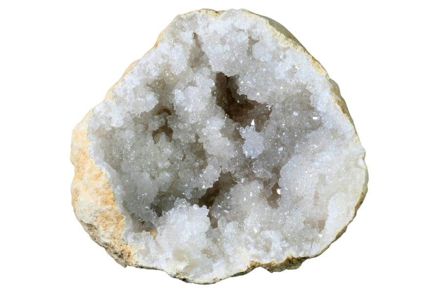 Half of an opened Geode showing sparkling white Quartz crystals