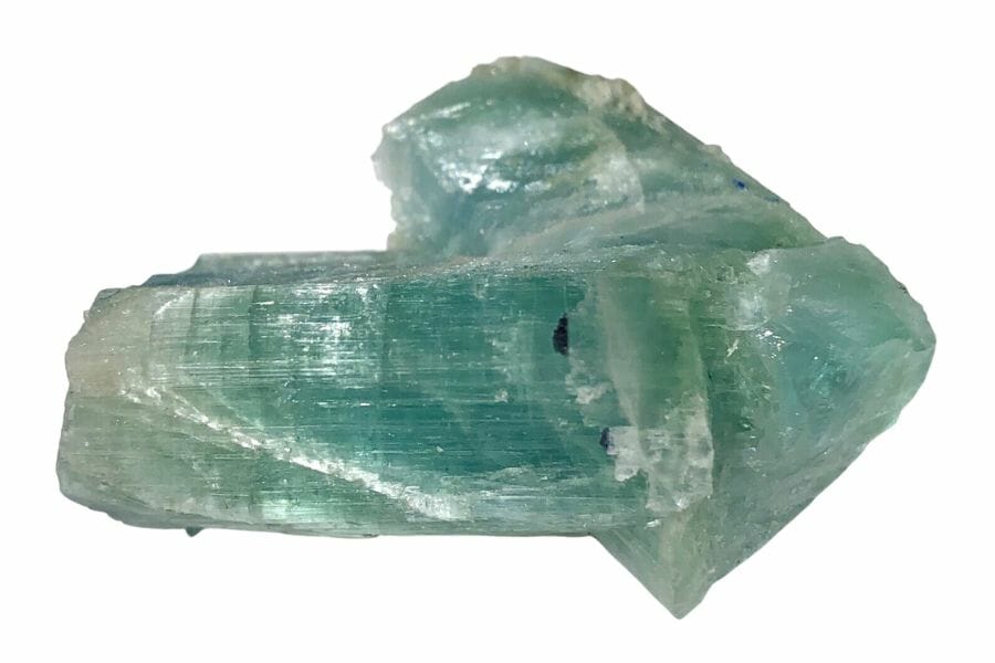 A unique arrowhead-shaped green tourmaline crystal 