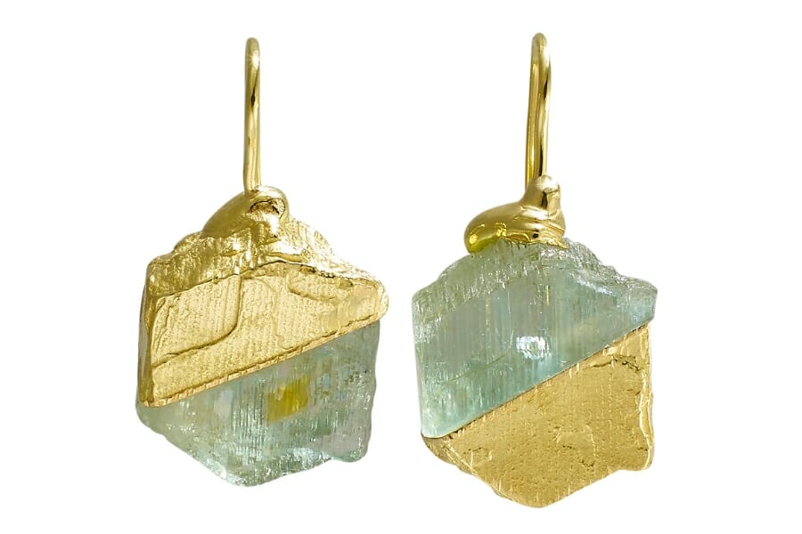 A pair of earrings made of Albite and gold