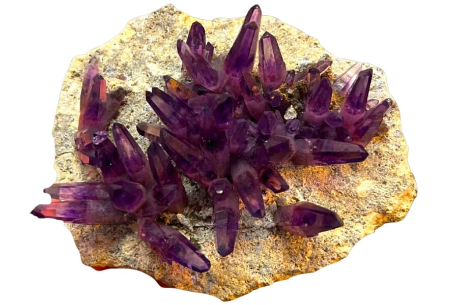 Stunning deep purple Amethyst crystals on a matrix